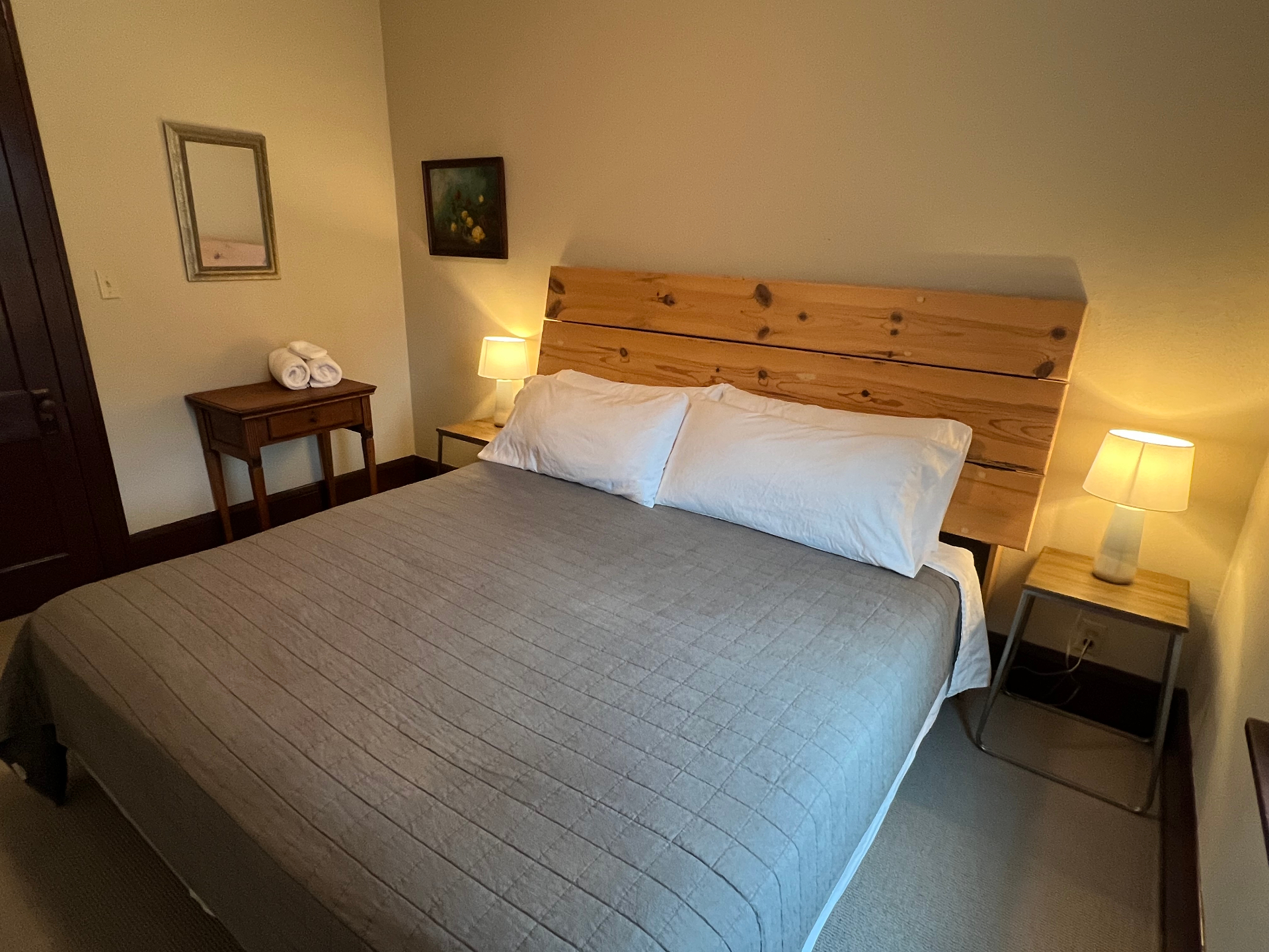 Bedroom with pine headboard